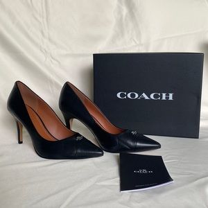 Black leather Coach pumps in 7.5. Box included!